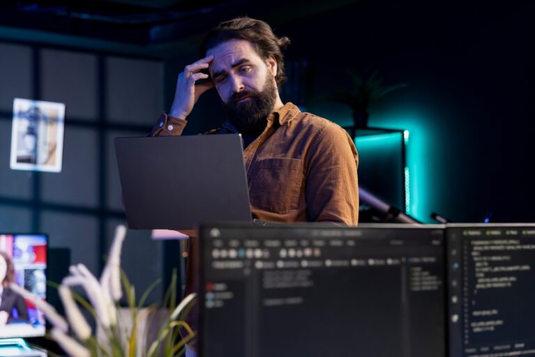 Programmer,Scratching,Head,In,Confusion,Trying,To,Secure,Company,Servers