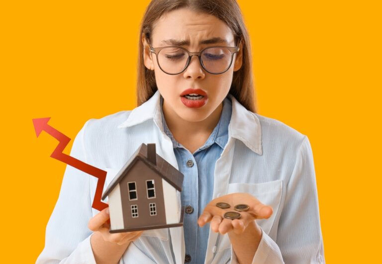 Upset,Young,Woman,With,Arrow,,Coins,And,House,Model,On