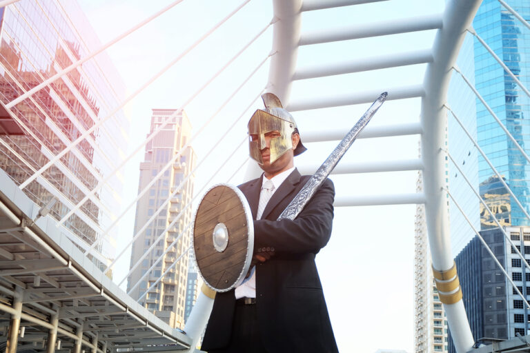 The,Stronger,Businessman,Wear,A,Knight,Mask,,Holding,A,Sword