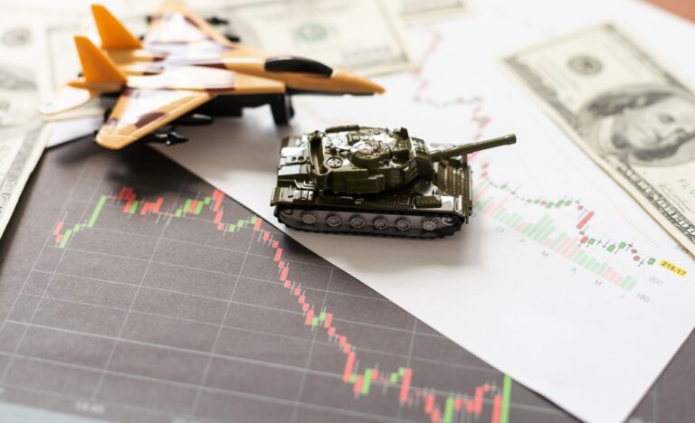 The,Main,Battle,Tank,On,Us,Dollar,Bill,Banknotes,Background.