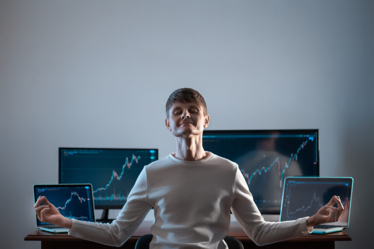 Relaxed,Successful,Male,Trader,Resting,With,Stock,Exchange,Graph,Or
