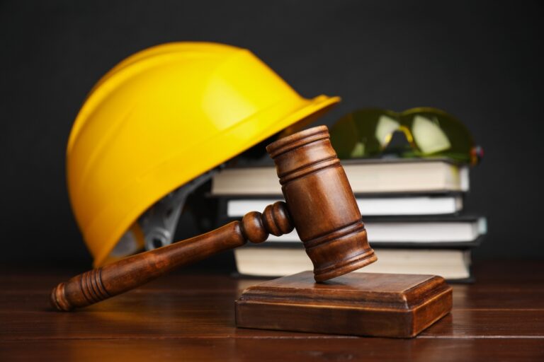 Accident,At,Work,Concept.,Gavel,,Books,And,Construction,Worker's,Protective