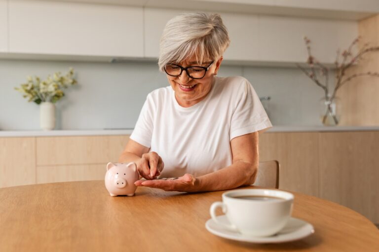 Saving,Money,Investment,For,Future.,Senior,Adult,Mature,Woman,Putting