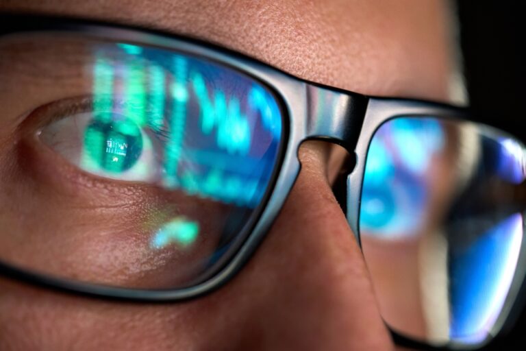 Focused,Crypto,Trader,Analyst,Wearing,Eyeglasses,Working,Looking,At,Computer