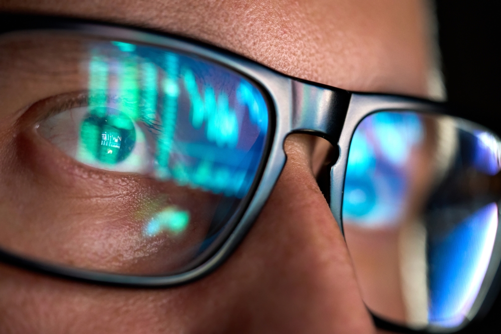 Focused,Crypto,Trader,Analyst,Wearing,Eyeglasses,Working,Looking,At,Computer