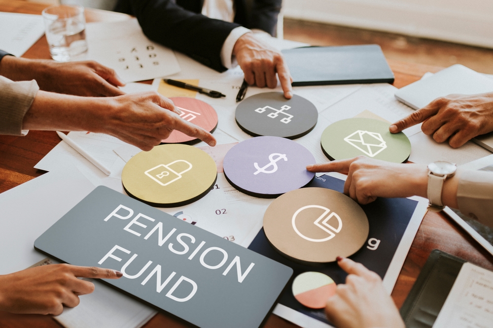 Diverse,Hands,Point,At,Pension,Fund,Icons,,Symbolizing,Finance,,Savings,