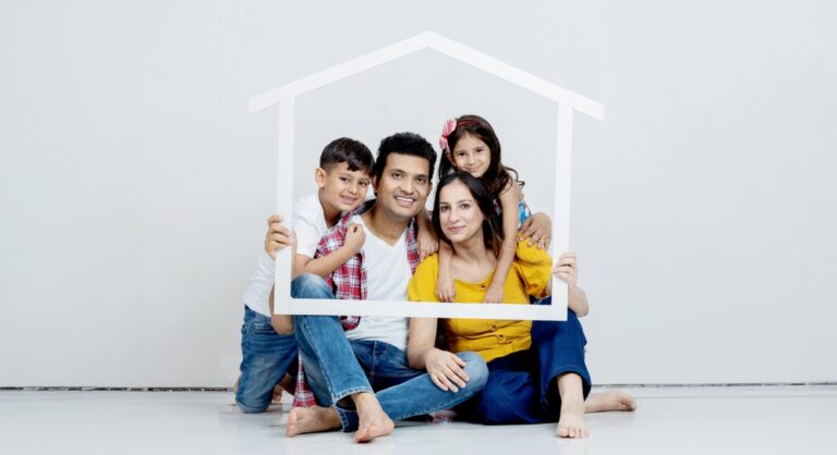 Roof,,Portrait,And,Happy,Family,With,Home,Sign,Board,While