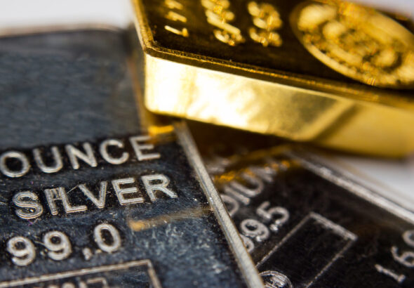 Close-up,Of,A,Gold-ingot,On,Top,Of,A,Troy,Ounce
