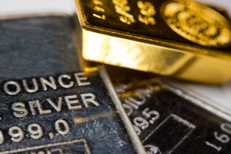 Close-up,Of,A,Gold-ingot,On,Top,Of,A,Troy,Ounce