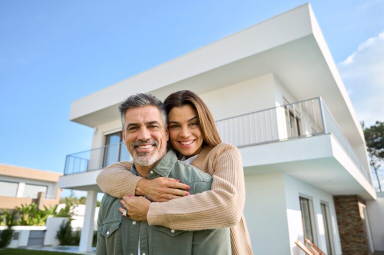 Happy,Smiling,Mature,Older,Family,Couple,New,Property,Buyers,Modern