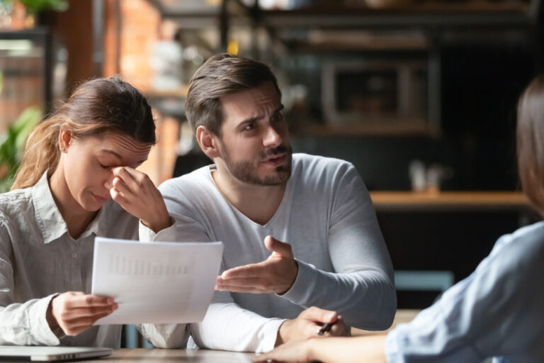 Angry,Young,Couple,Complaining,,Bad,Contract,Terms,,Outraged,Man,Arguing