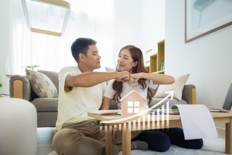 Asian,Couple,In,Home,Or,House.,Include,Increasing,Graph,,Laptop,