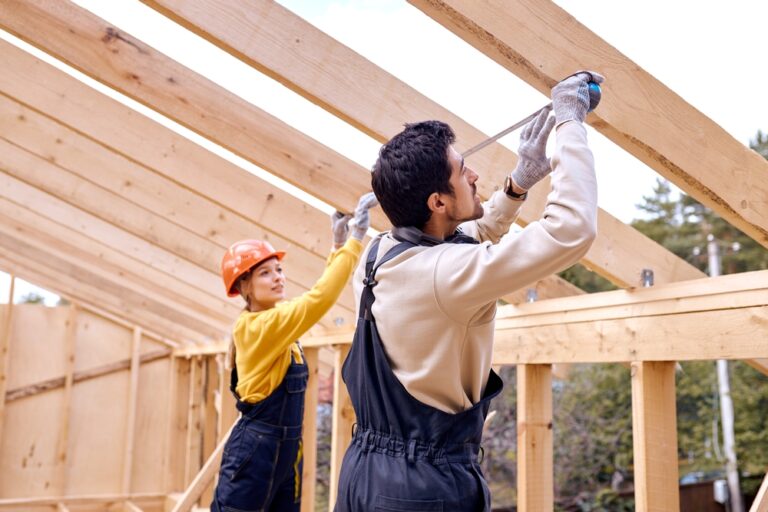 Repair,Of,Wooden,Roof,Outdoors.,Two,Constructors,In,Special,Clothes