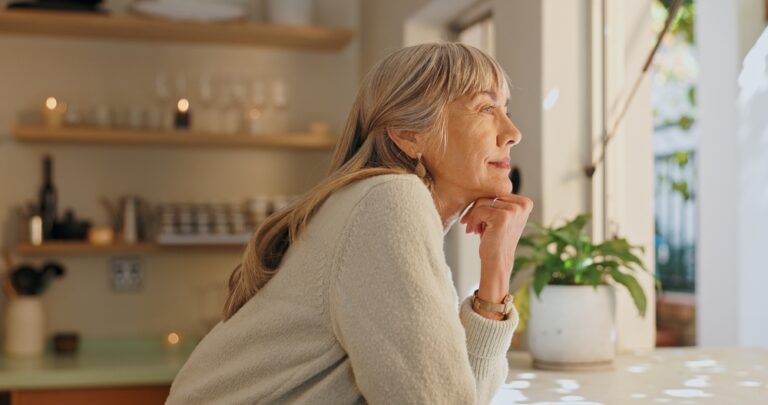Window,,Smile,And,Elderly,Woman,With,Thinking,At,Home,For