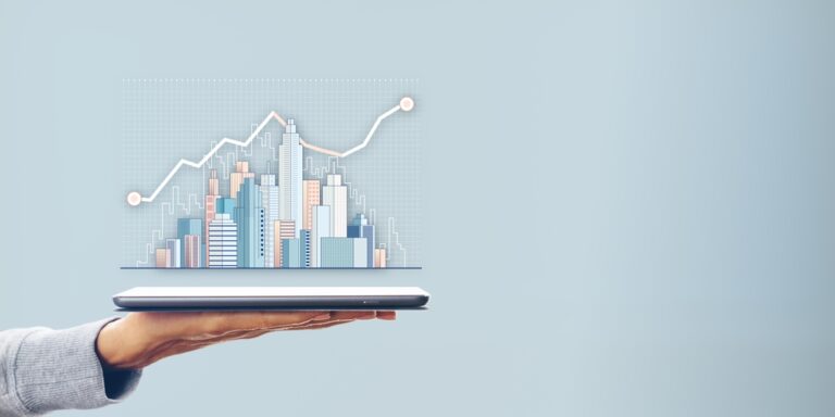 A,Hand,Holding,A,Tablet,With,A,Digital,City,Skyline