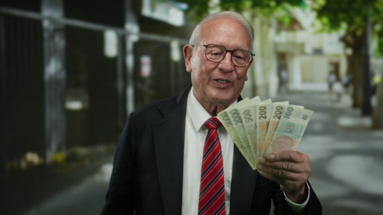 Senior,Man,Holding,Czech,Koruna,Banknotes,In,Business,Attire,On