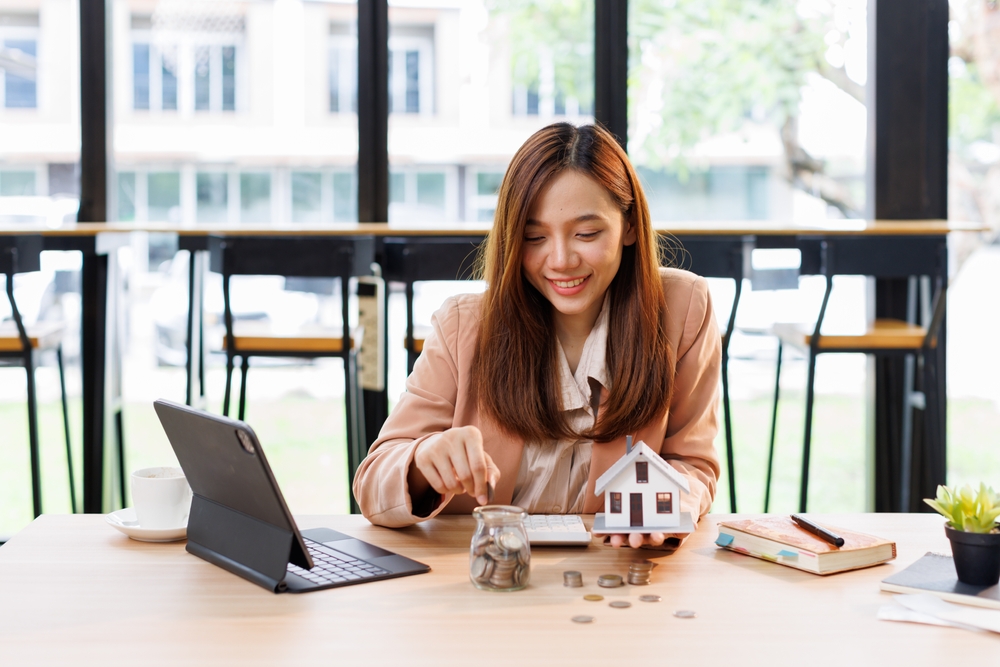 House,Model,And,Money,Coins,Saving,For,Concept,Saving,Money