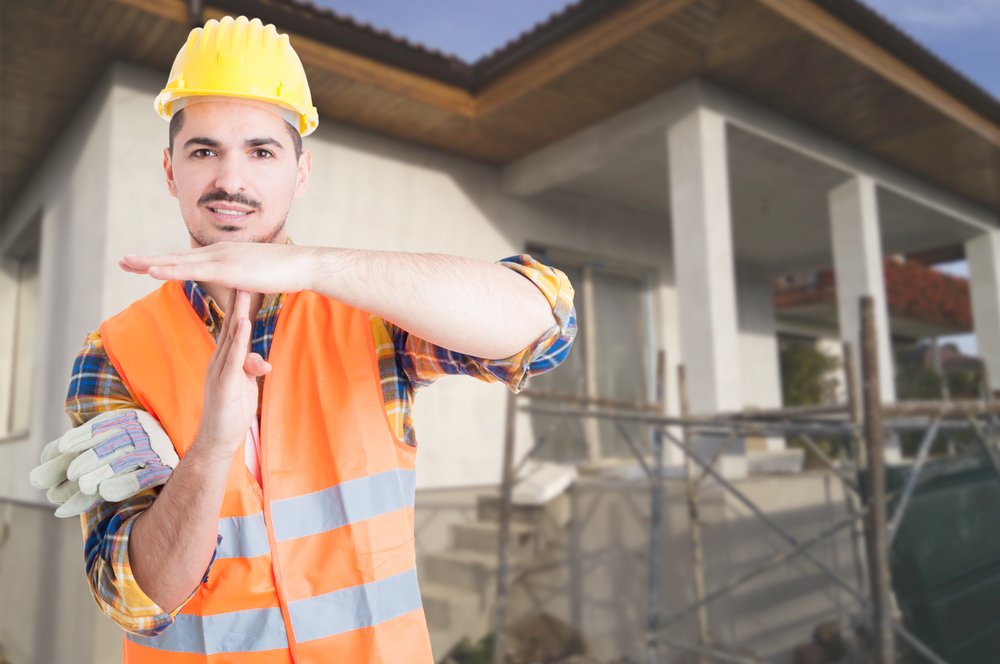 Young,Architect,Standing,Outside,On,Building,Site,And,Doing,Timeout