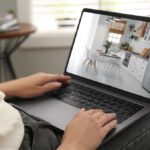 Woman,Looking,For,House,On,Real,Estate,Market,Website,At