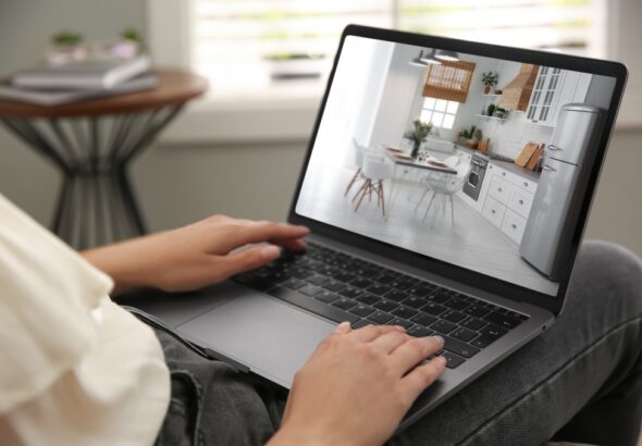 Woman,Looking,For,House,On,Real,Estate,Market,Website,At