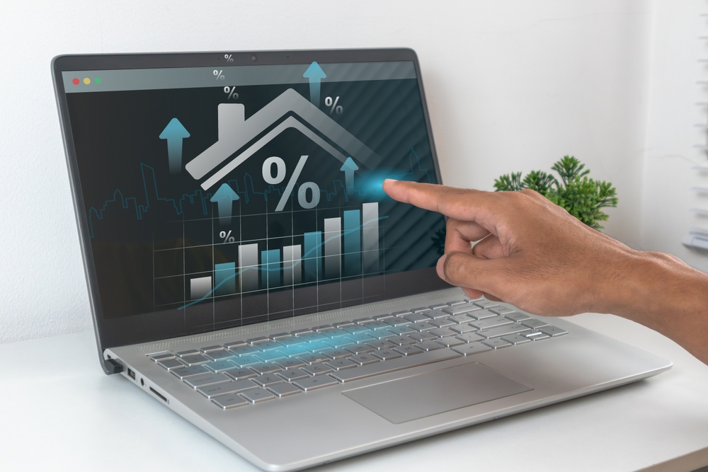 A,Man,Analyzing,Real,Estate,Market,Growth.,House,Price,Rising