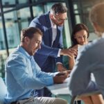 Proposal,,Laptop,And,Project,Management,Director,With,Report,,Collaboration,And