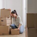 Pretty,Single,Young,Woman,Tired,Of,Carrying,Moving,Boxes,In