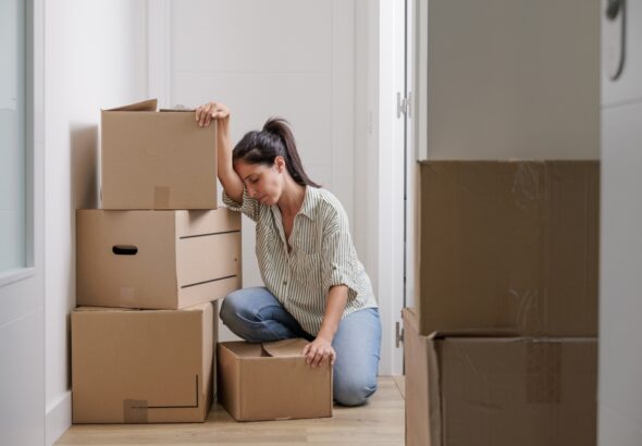 Pretty,Single,Young,Woman,Tired,Of,Carrying,Moving,Boxes,In
