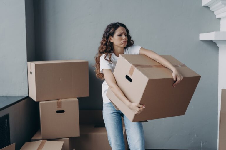 Tired,Young,Woman,Renter,Exhausted,Of,Carrying,Heavy,Cardboard,Boxes