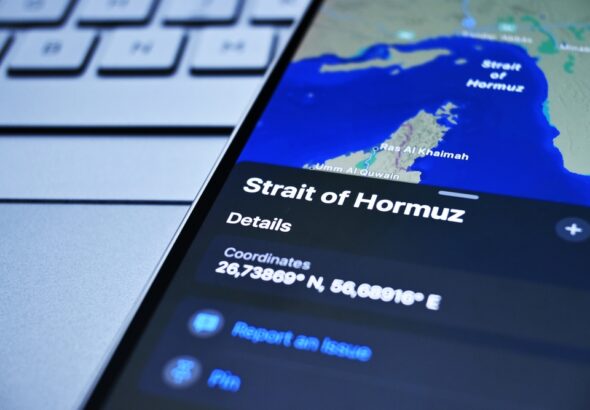 The,Phone,Screen,Displays,A,Map,Showing,The,Location,Of