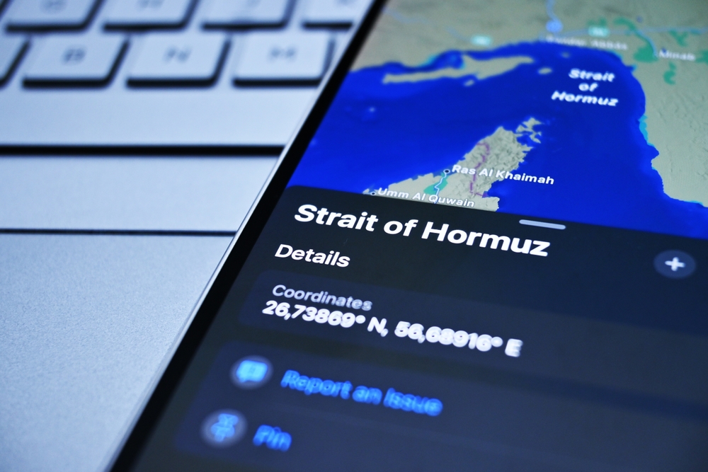 The,Phone,Screen,Displays,A,Map,Showing,The,Location,Of