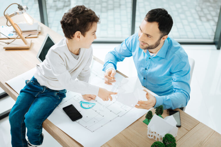 Childlike,Curiosity.,Sweet,Little,Boy,Sitting,On,The,Table,In