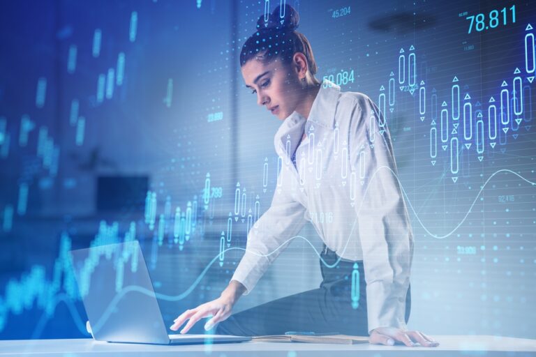 Attractive,Young,Female,Working,On,Desk,With,Glowing,Candlestick,Forex