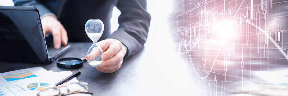 Working,Time,Symbolizes,An,Hourglass.,Office,Desk,With,Insurance,Manager