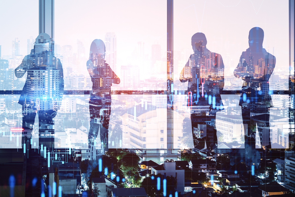 Colleages,Standing,On,Abstract,Illuminated,City,Background,With,Forex,Chart.