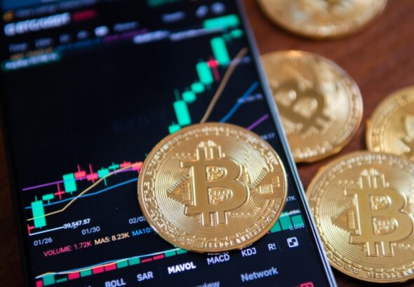 Growing,Bitcoin,With,A,Smartphone,With,The,Bybit,App,Open.