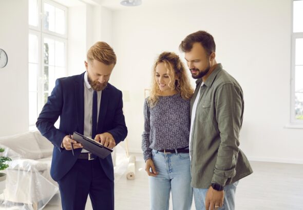 Reaching,Agreement.,Excited,Young,Married,Couple,Of,Clients,Going,To