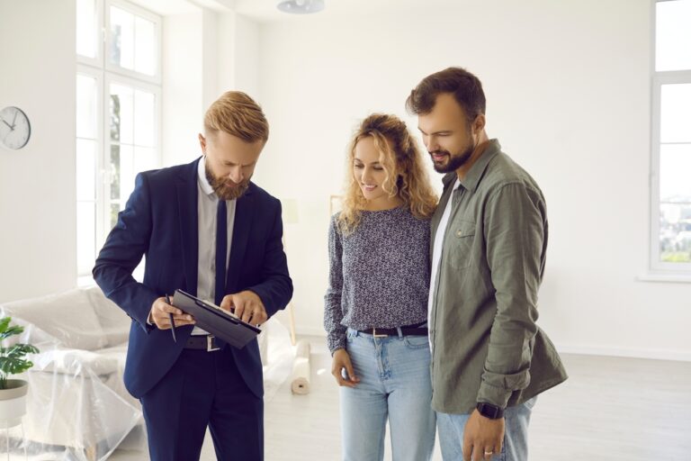 Reaching,Agreement.,Excited,Young,Married,Couple,Of,Clients,Going,To