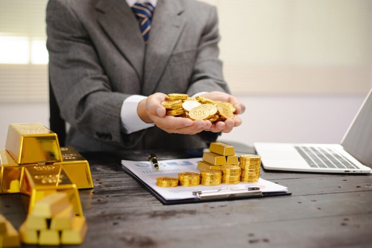 Illustration,Of,Businessman,Working,Hard,With,Gold,Bars,,Evaluating,Investments