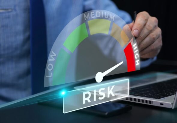Businessman,Selecting,High,Risk,Management,Level,On,Virtual,Scale,Decision