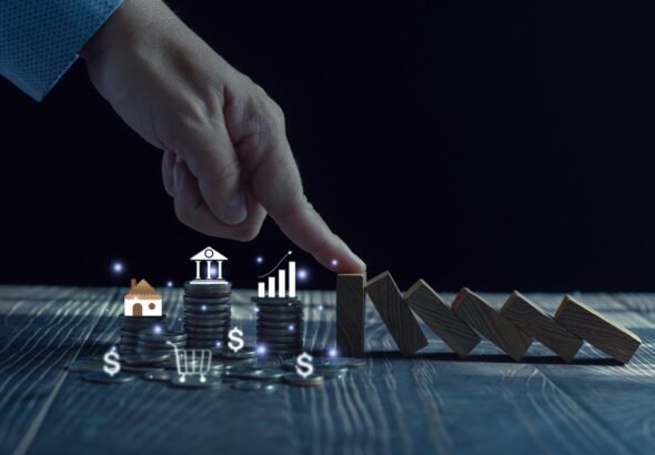 Economic,Collapse,Concept,,Hands,Stop,Domino,Crisis,Effect,,Financial,And