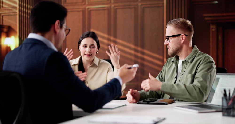 Young,Couple,Meeting,With,Family,Divorce,Lawyer,For,Financial,Consulting.