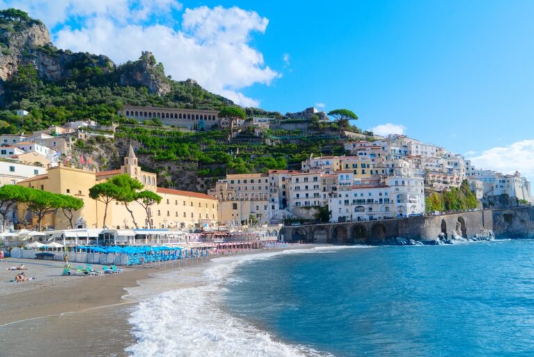 Amalfi,Old,Town,And,Summer,Beach,With,Umbrellas,,,Italy