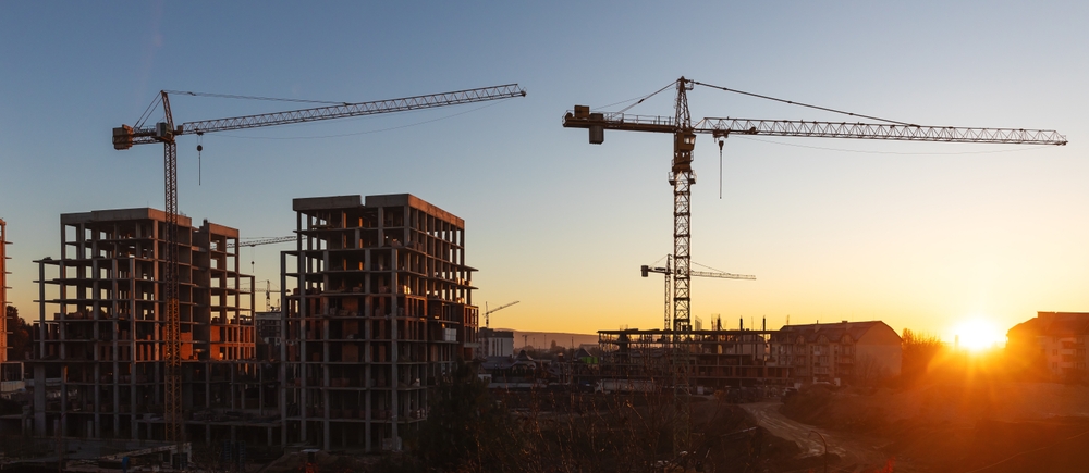 Construction,Boom,In,Western,Ukraine.,A,Construction,Crane,Silhouetted,Against