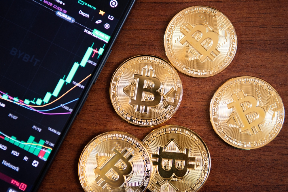 Growing,Bitcoin,With,A,Smartphone,With,The,Bybit,App,Open.