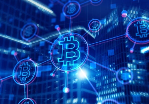 Bitcoin,On,Corporate,Skyscrapers,And,Office,Blocks,Background.,Cryptocurrency,Future