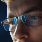 Close,Up,View,Of,Focused,Trader,Wears,Eyeglasses,Looking,At