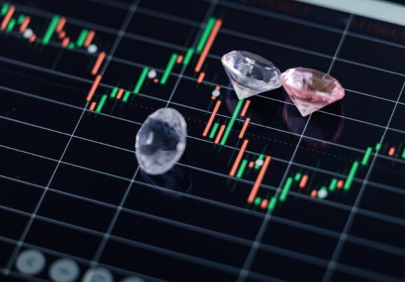 Diamonds,Natural,And,Artificial,On,Stock,Trading,Chart,Displaying,Market