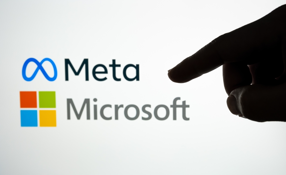 Silhouette,Of,Hand,In,Front,And,Blurred,Facebook,Meta,And
