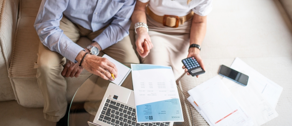 Senior,Couple,Calculating,Expenses,And,Reviewing,Documents,For,Financial,Planning